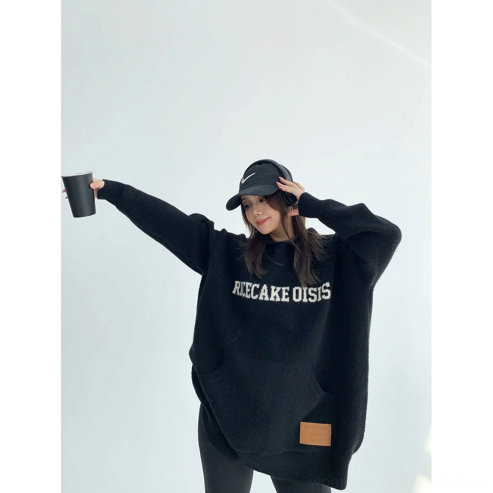 Cozy oversized graphic hoodie with soft fluffy knit construction, dropped shoulders, ribbed trims, and modern streetwear appeal