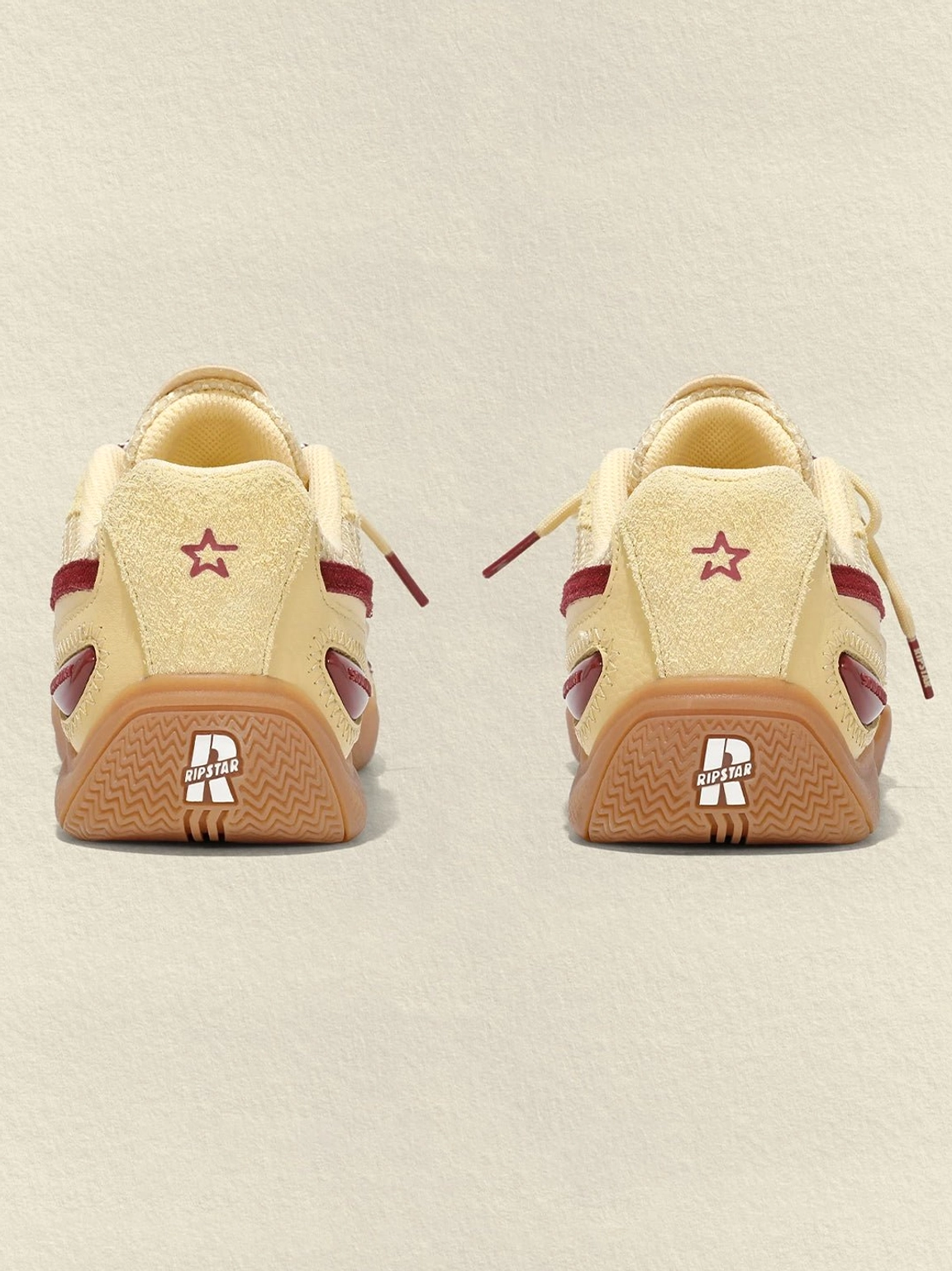 Cream burgundy star retro running sneakers classic gum sole and contrast star streetwear design view