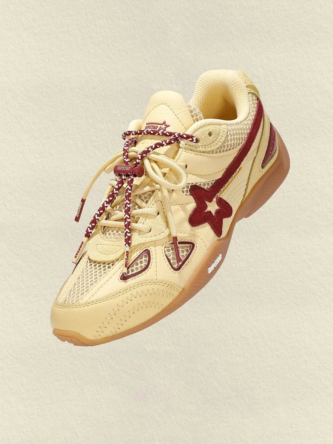 Cream burgundy star retro running sneakers detailed product view for vintage sport streetwear styling