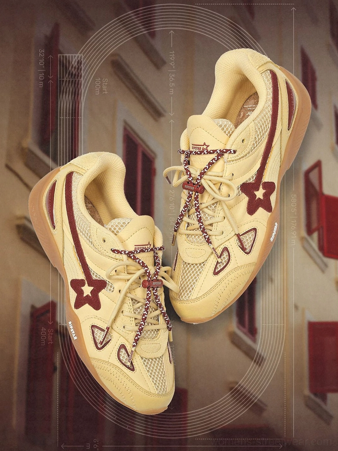 Pair of cream burgundy star retro running sneakers flat lay showing patterned laces, layered panels and side star details