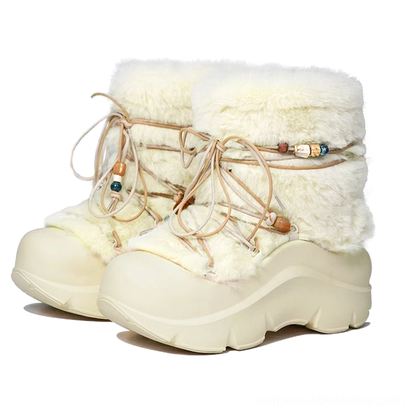 Pair of cream white faux fur platform snow boots with dual beaded drawstrings, plush uppers, and chunky winter soles