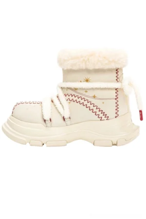 Cream furry platform snow boot side view with plush wool collar red zigzag stitching fuzzy laces and gold star embroidery