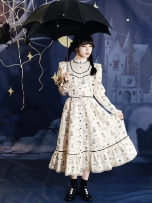 Front full-body view of cream ghost print Victorian gothic Lolita midi dress with black lace trims and velvet ribbons in a Halloween castle setting