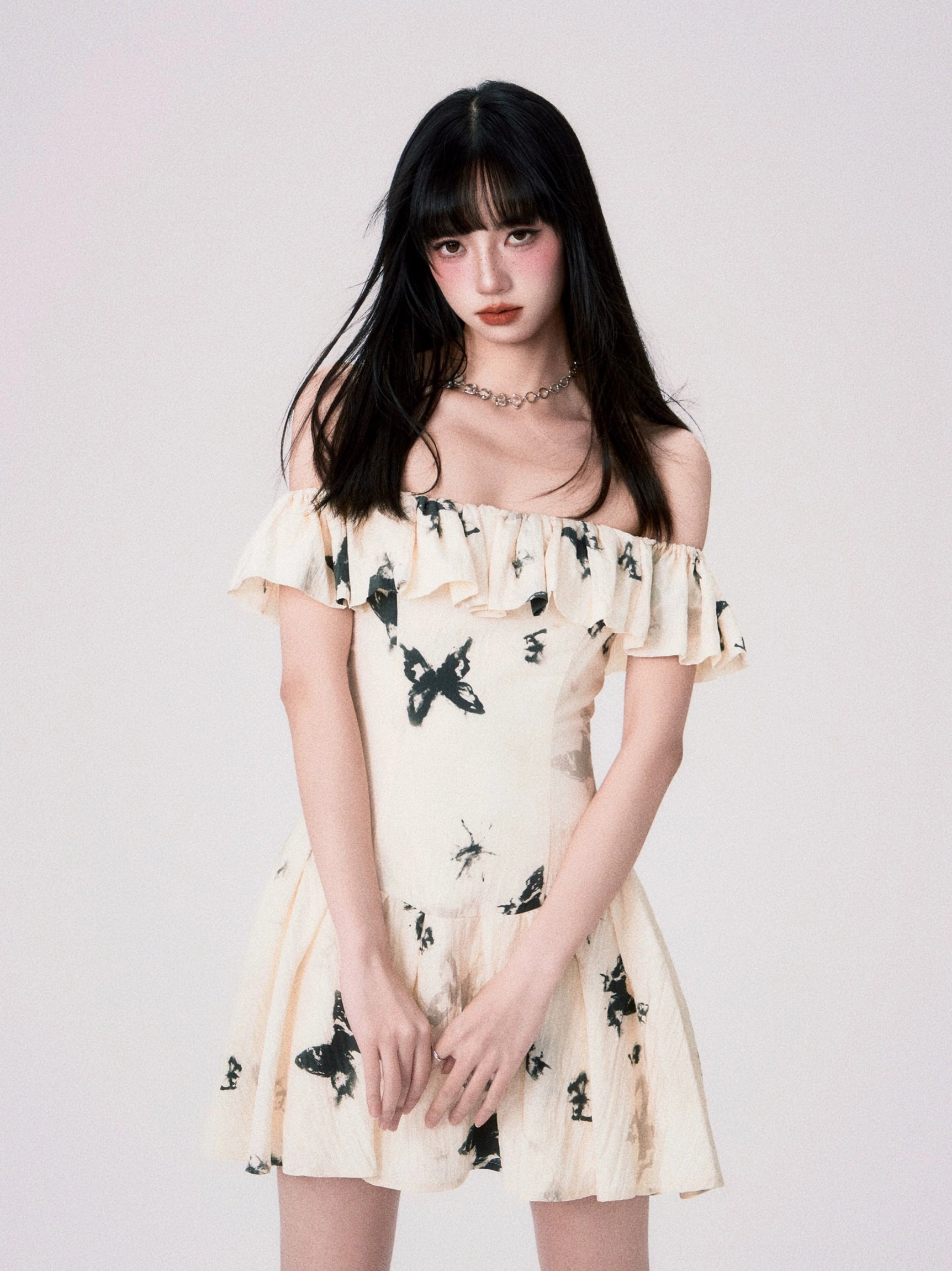 Cream ink butterfly ruffle dress with fitted waist streetwear outfit view