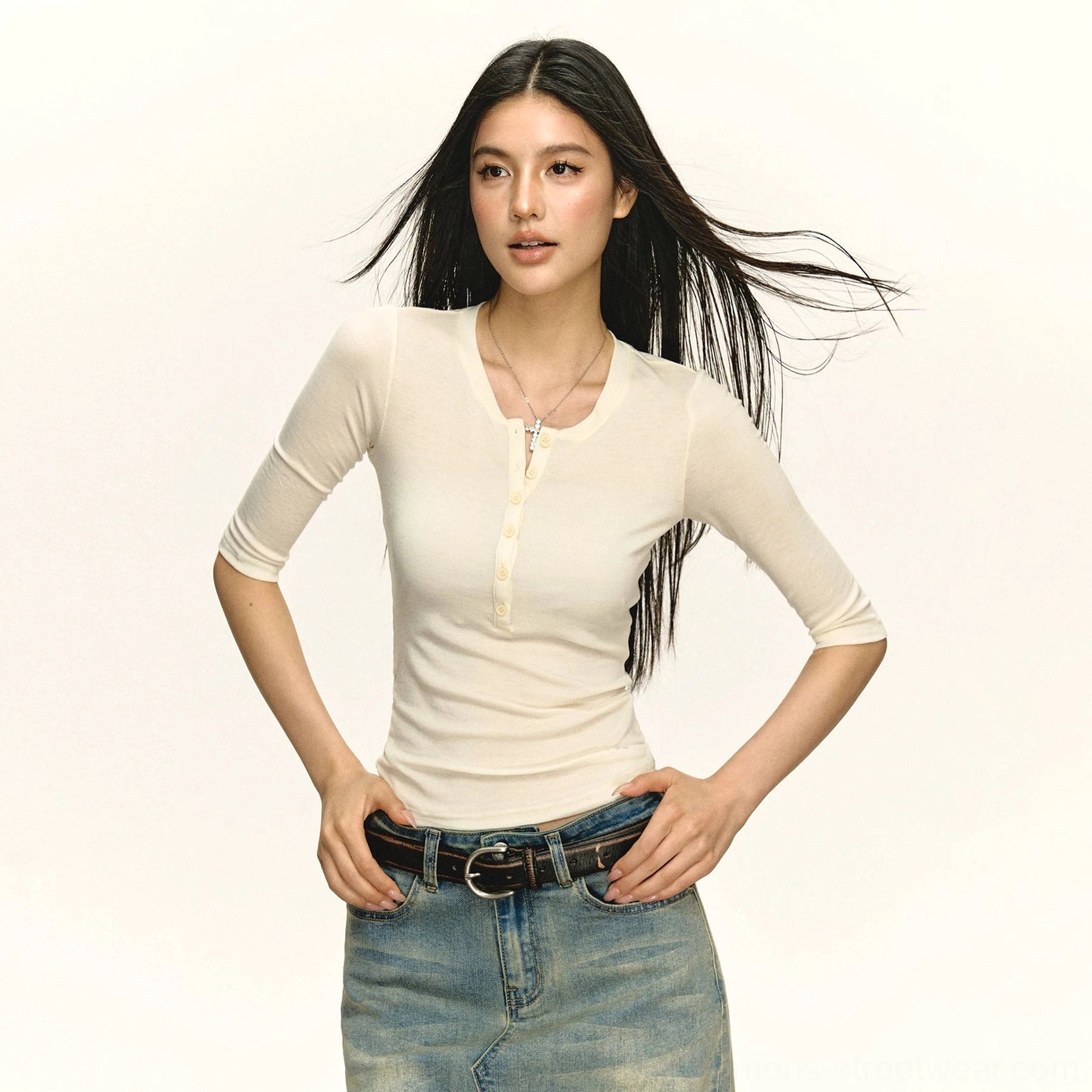 Cream ivory fitted ribbed Henley top with three-quarter sleeves and button placket styled with denim skirt