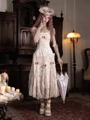 Cream lace heart cutout midi dress with pink ribbon bows and flared tulle skirt side view