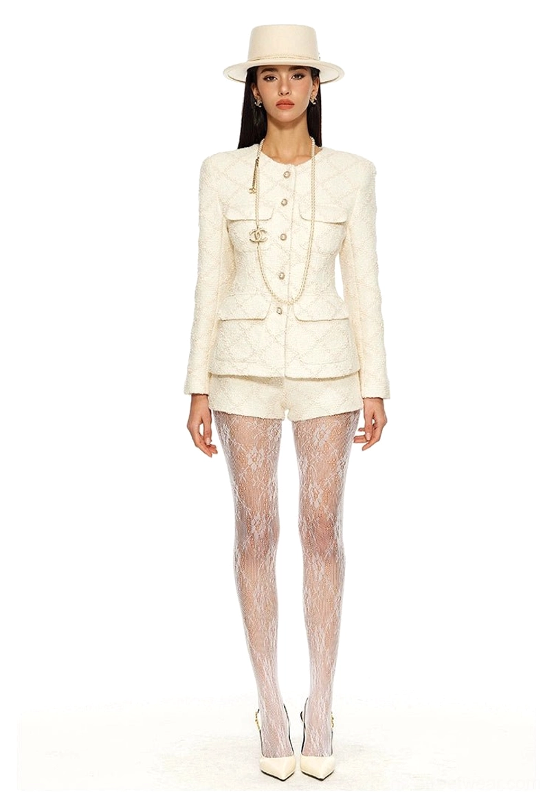 Cream tweed blazer and mini shorts suit with four flap pockets round neckline and slim tailored fit for elegant streetwear