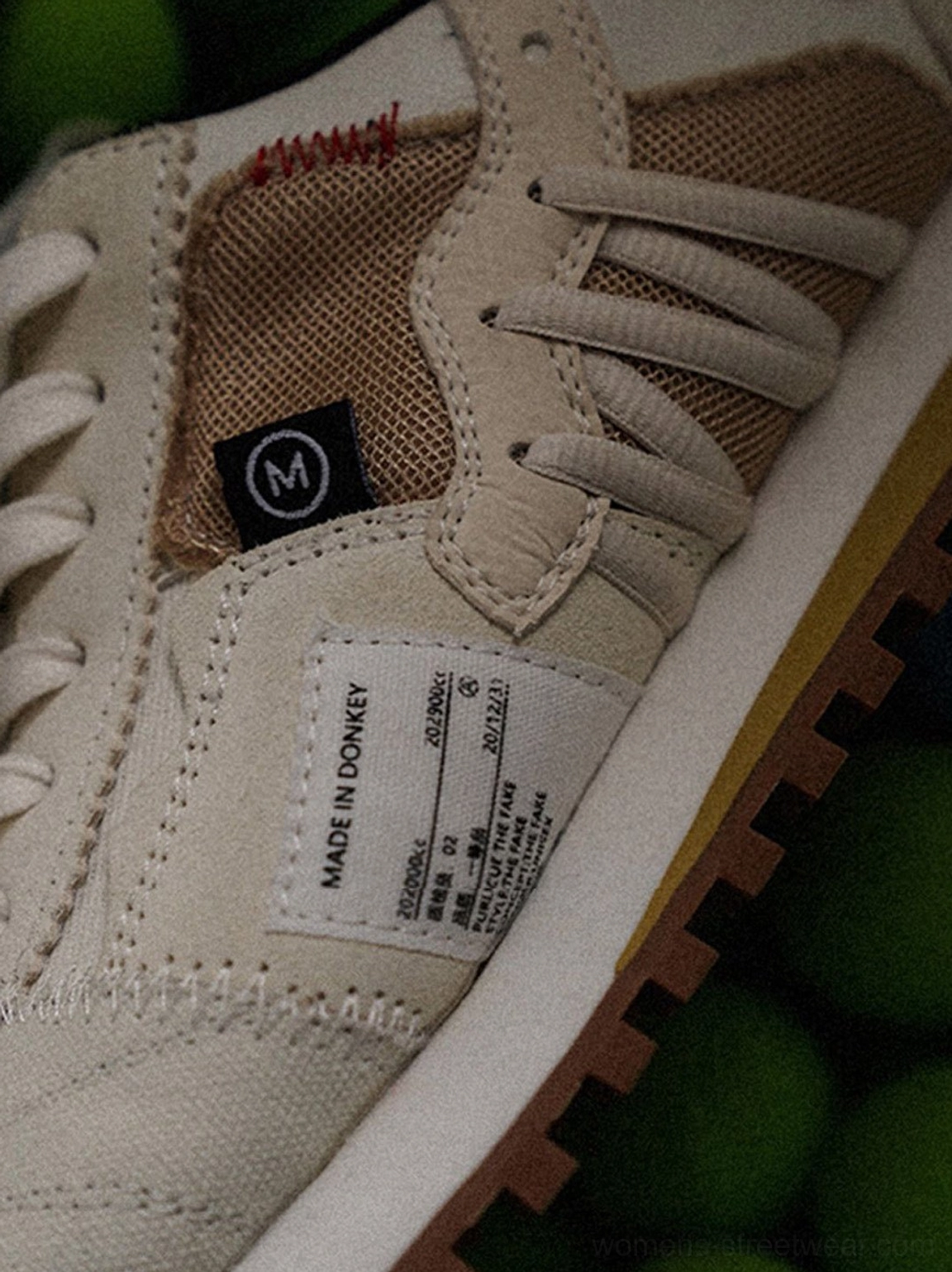 Cream white retro running shoes with black accents and gum waffle soles designed for Korean streetwear and everyday outfits