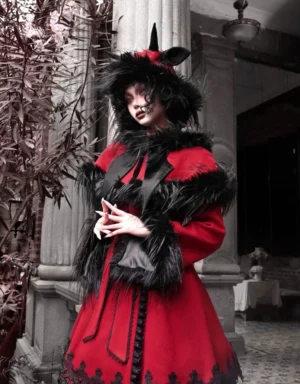 Crimson faux fur trim gothic cape coat dress set in three-quarter front view with black lace hem