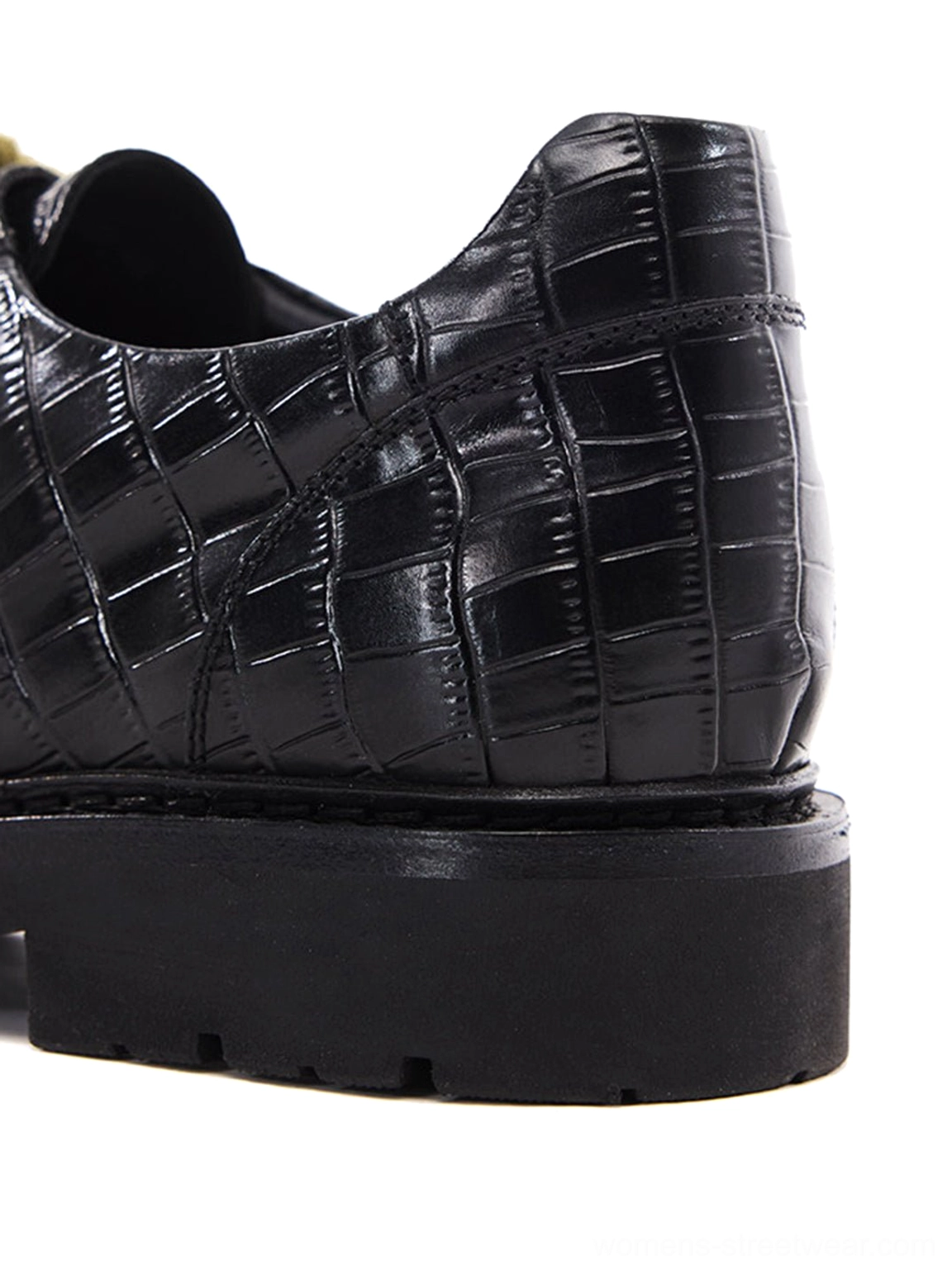 Croc-embossed black leather derby shoe design with olive green laces, rounded toe, silver hardware, and rugged outsole