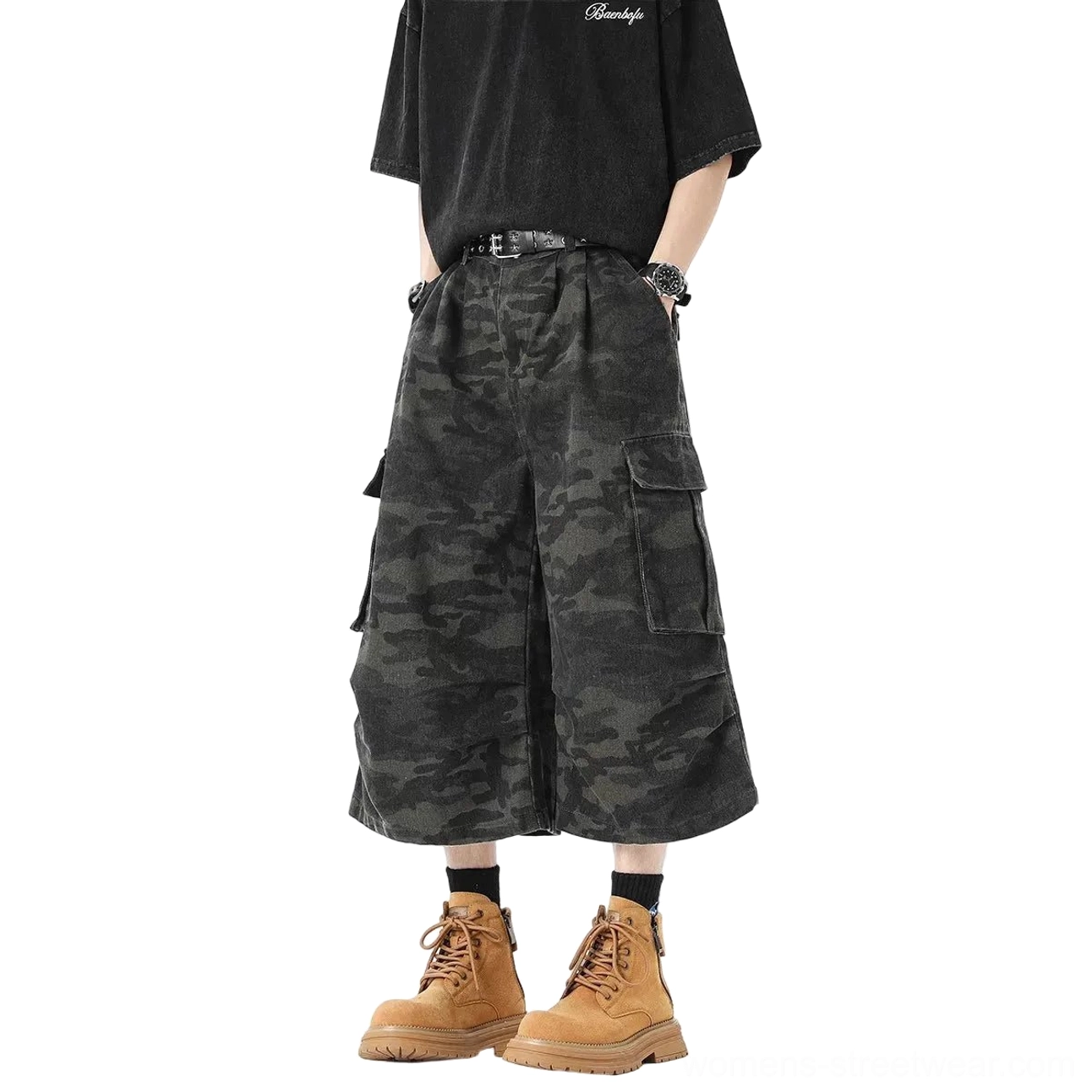 Back view of cropped wide-leg camouflage cargo pants with flap pockets styled with a black cropped tee and rugged work boots
