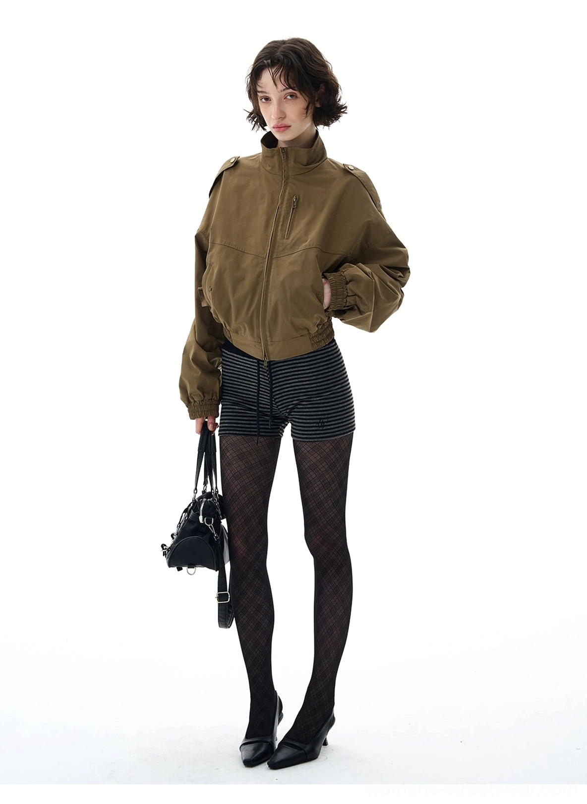 Side front view of a cropped olive utility bomber jacket with loose batwing sleeves and high stand collar