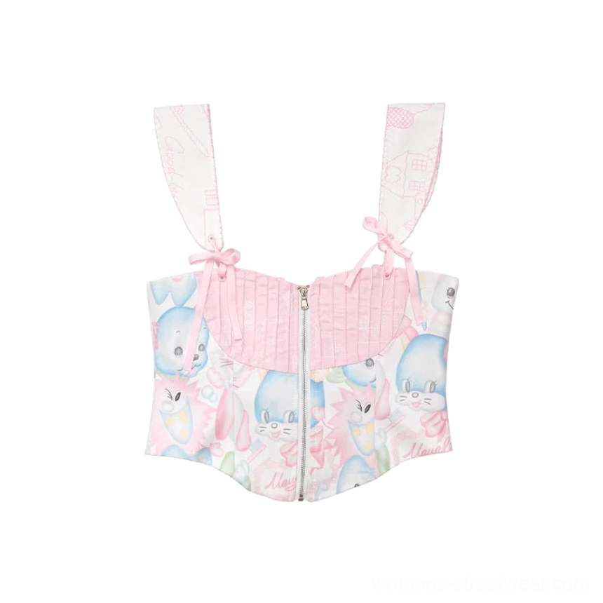 Flat lay front view of a cropped pastel bunny print corset camisole with adjustable tie-up straps and front zipper