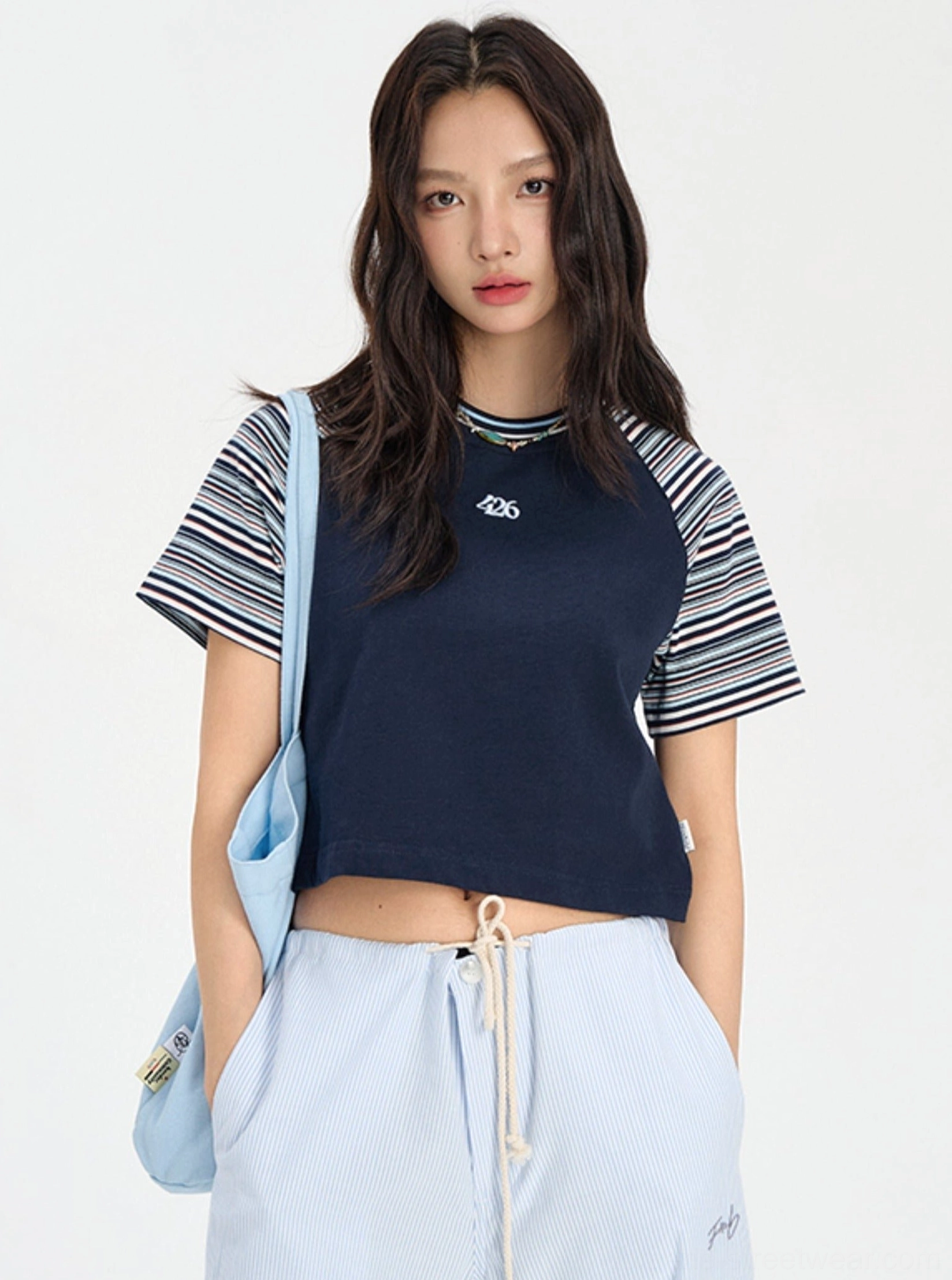 Navy cropped rainbow stripe raglan baby tee for retro Y2K streetwear styling