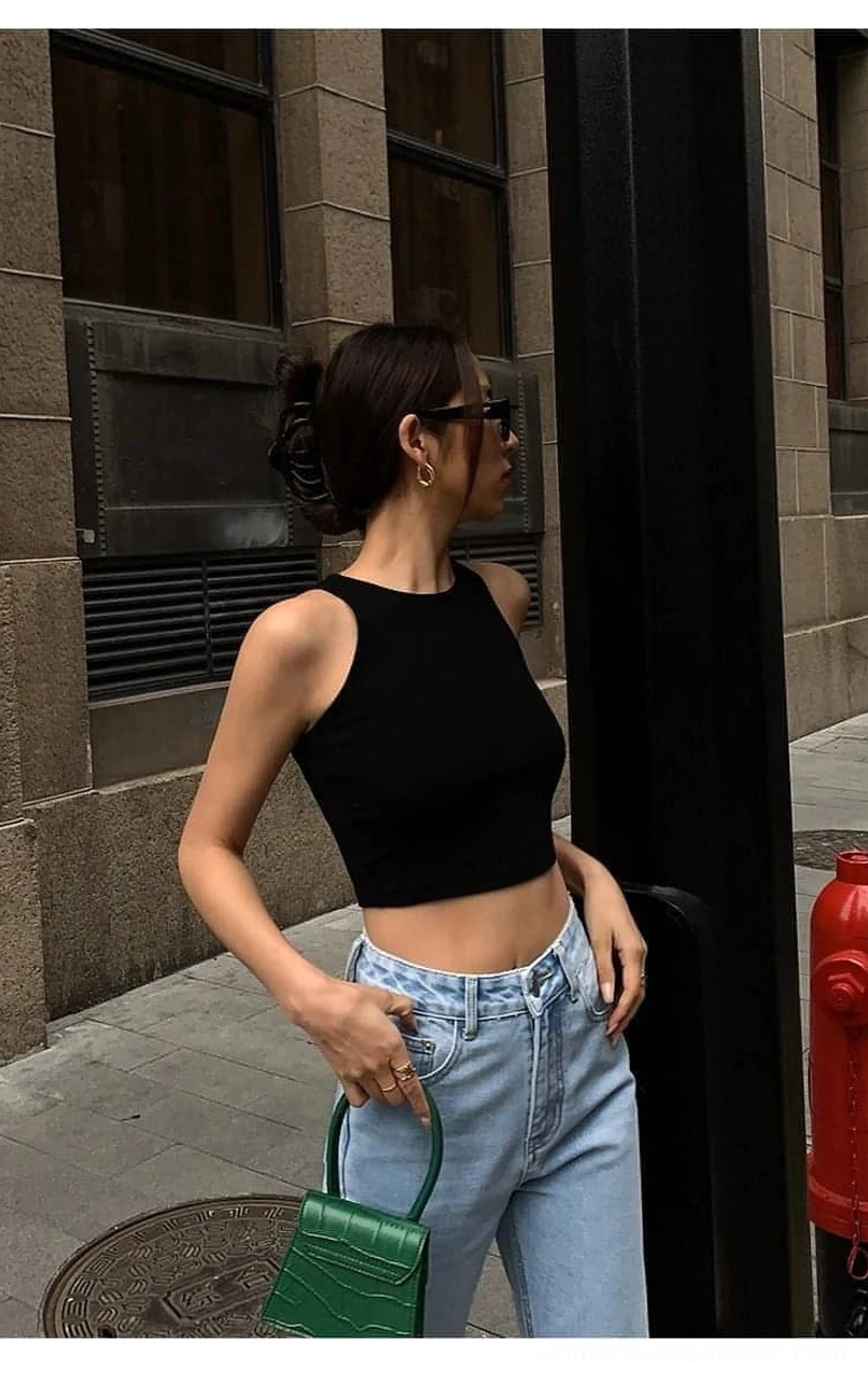 Cropped tank top back design - exposed waistline showing sleeveless ribbed knit construction perfect for contemporary streetwear and high-waisted silhouette styling