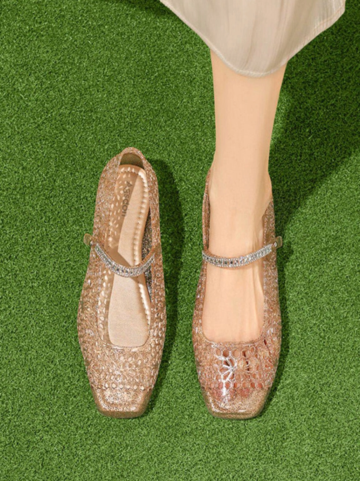Crystal glitter jelly Mary Jane flats with floral cutout upper and adjustable buckle strap detail