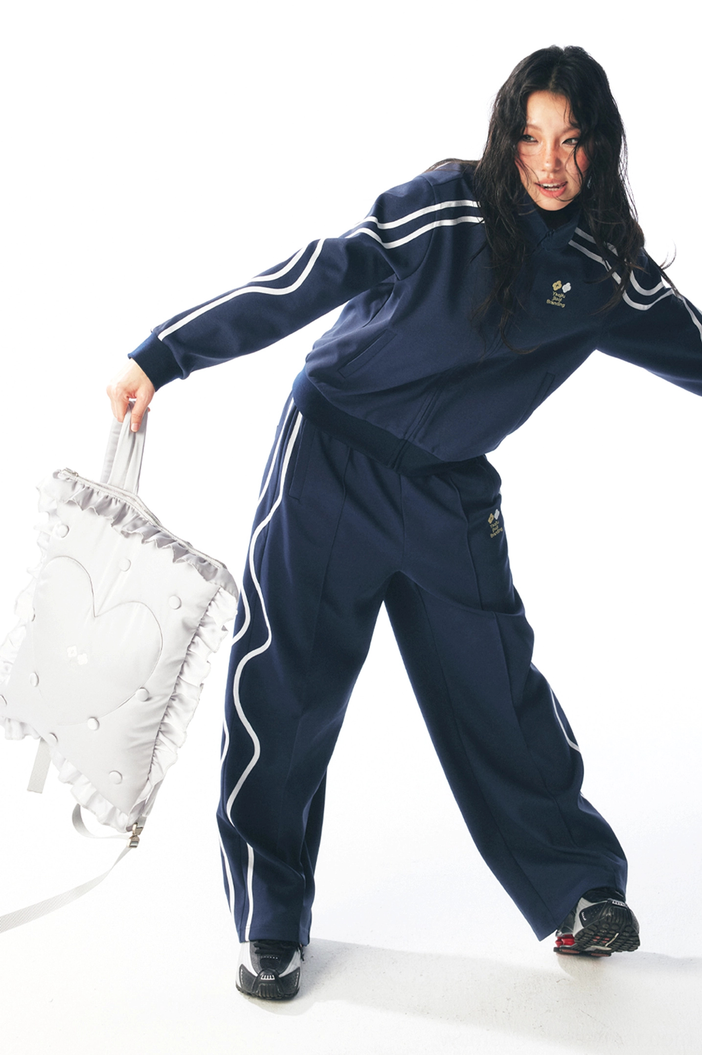 Curved stripe quick-dry track pants in a modern wide-leg streetwear silhouette