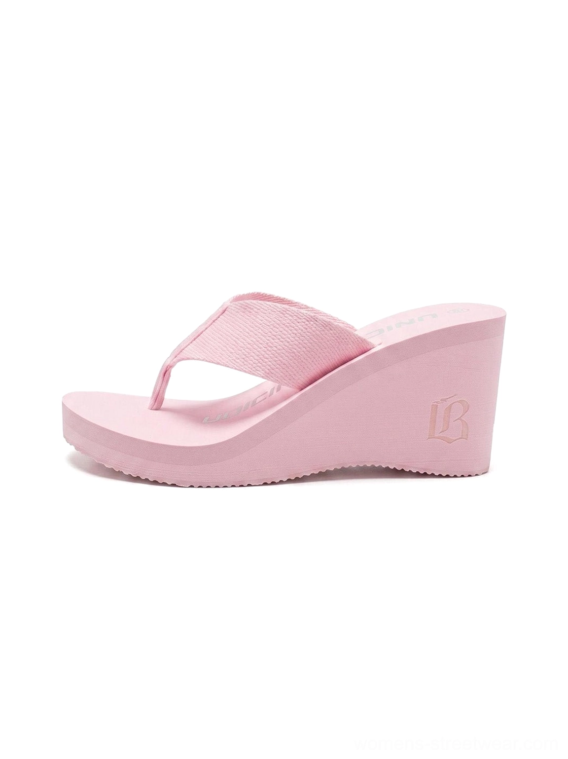 Light pink cushioned 8 cm wedge platform flip-flops for women shown in a side product view with textured thong strap and matte finish