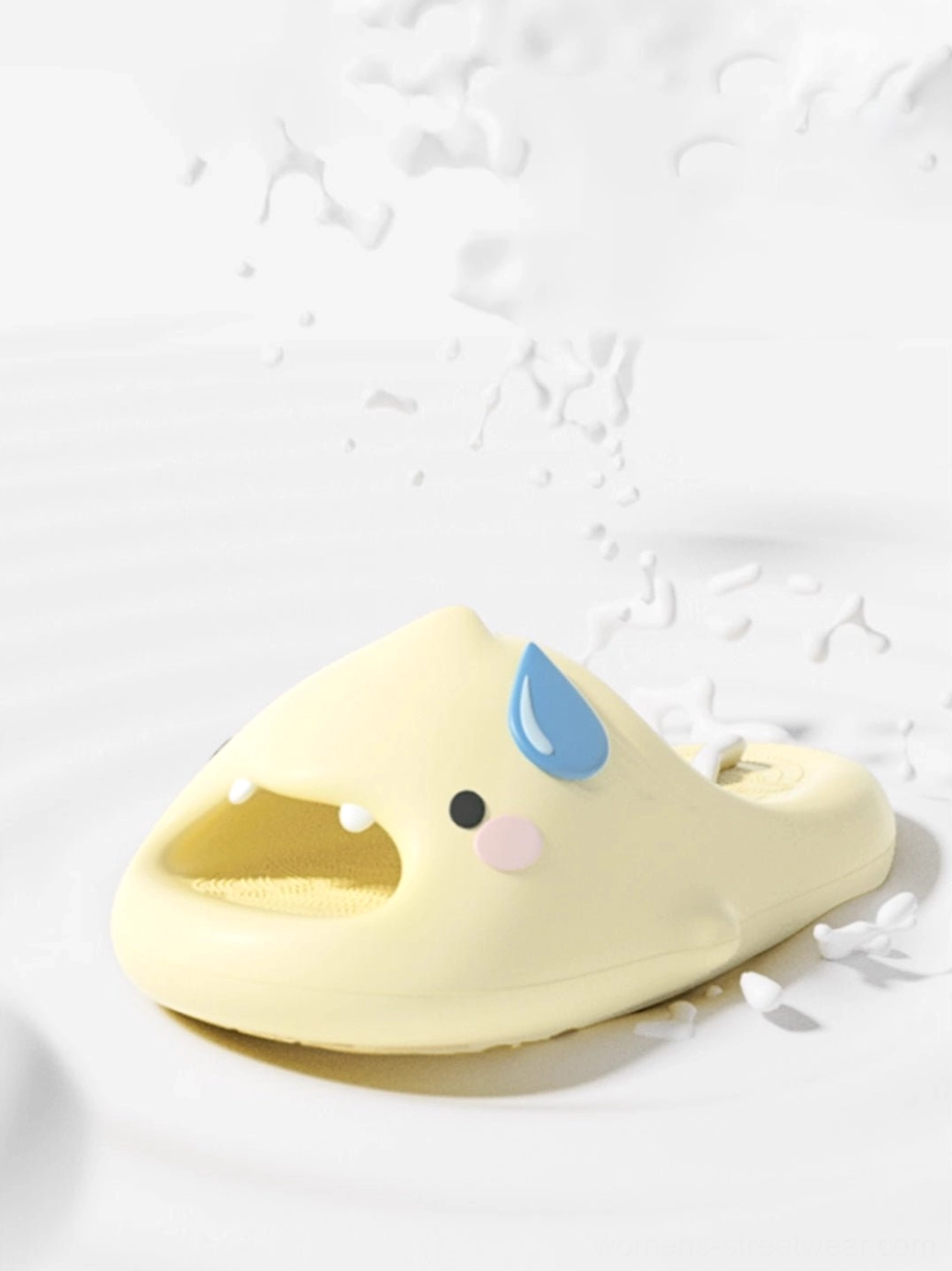 Single yellow shark platform slide slipper in three-quarter view showing open toe smooth EVA upper and cartoon face