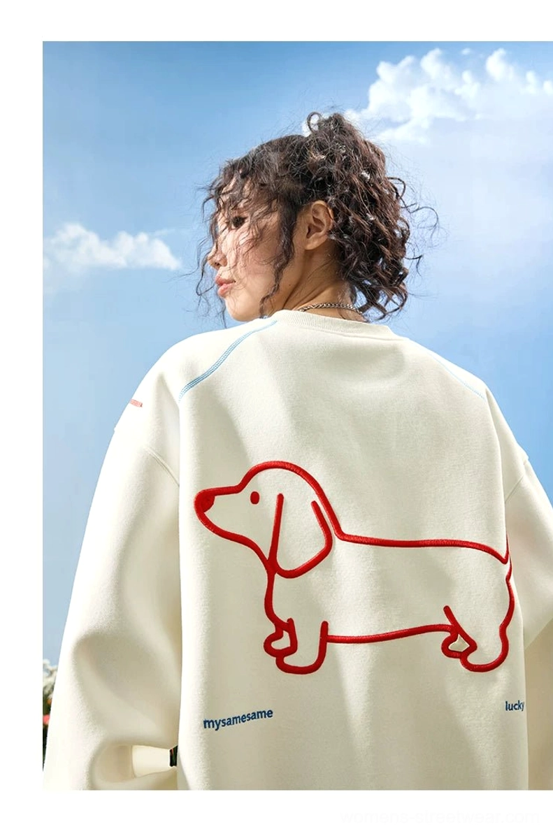 Dachshund embroidered oversized sweatshirt fashion detail with red dog graphic, fleece lining, and colorful contrast stitching