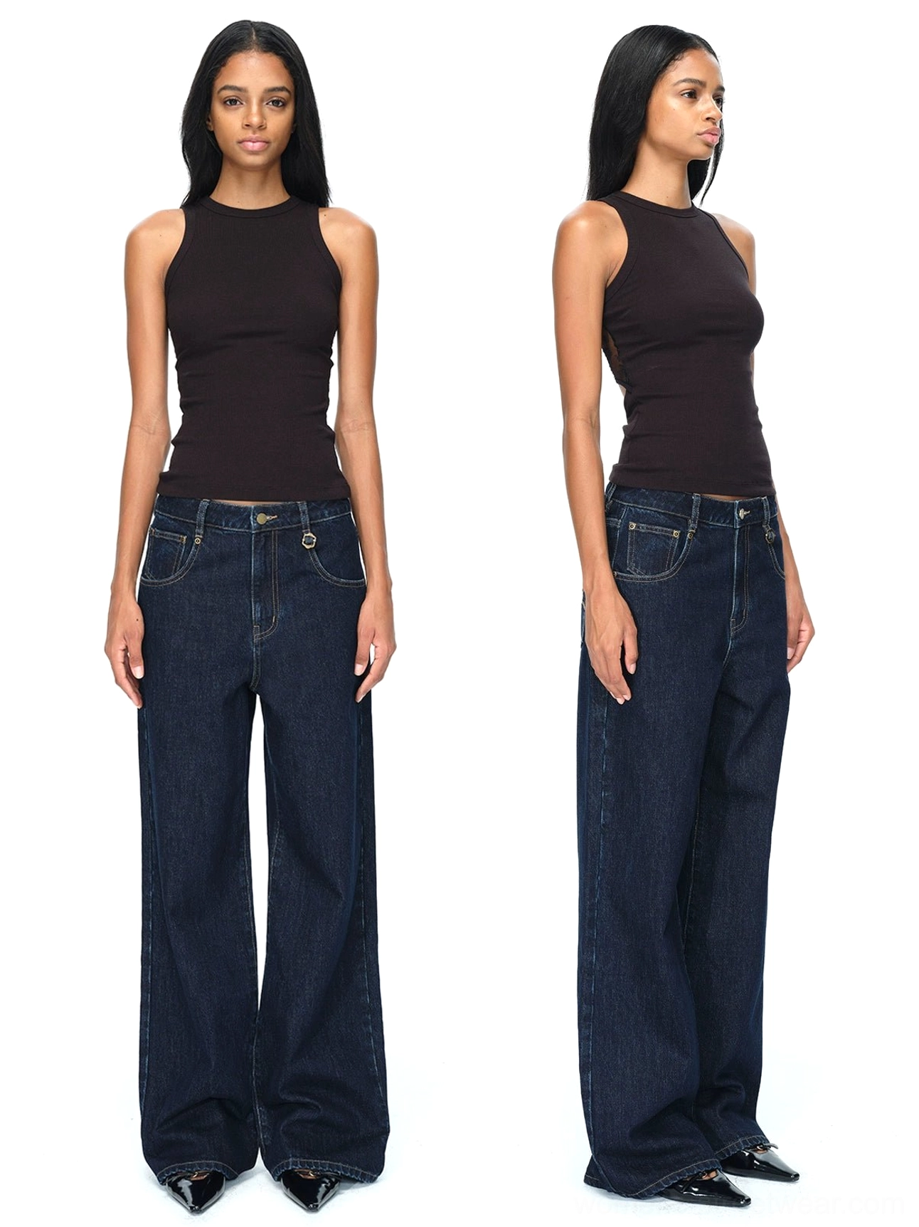 Dark blue raw denim wide-leg jeans styled with a black tank top and pointed heels in a modern streetwear outfit