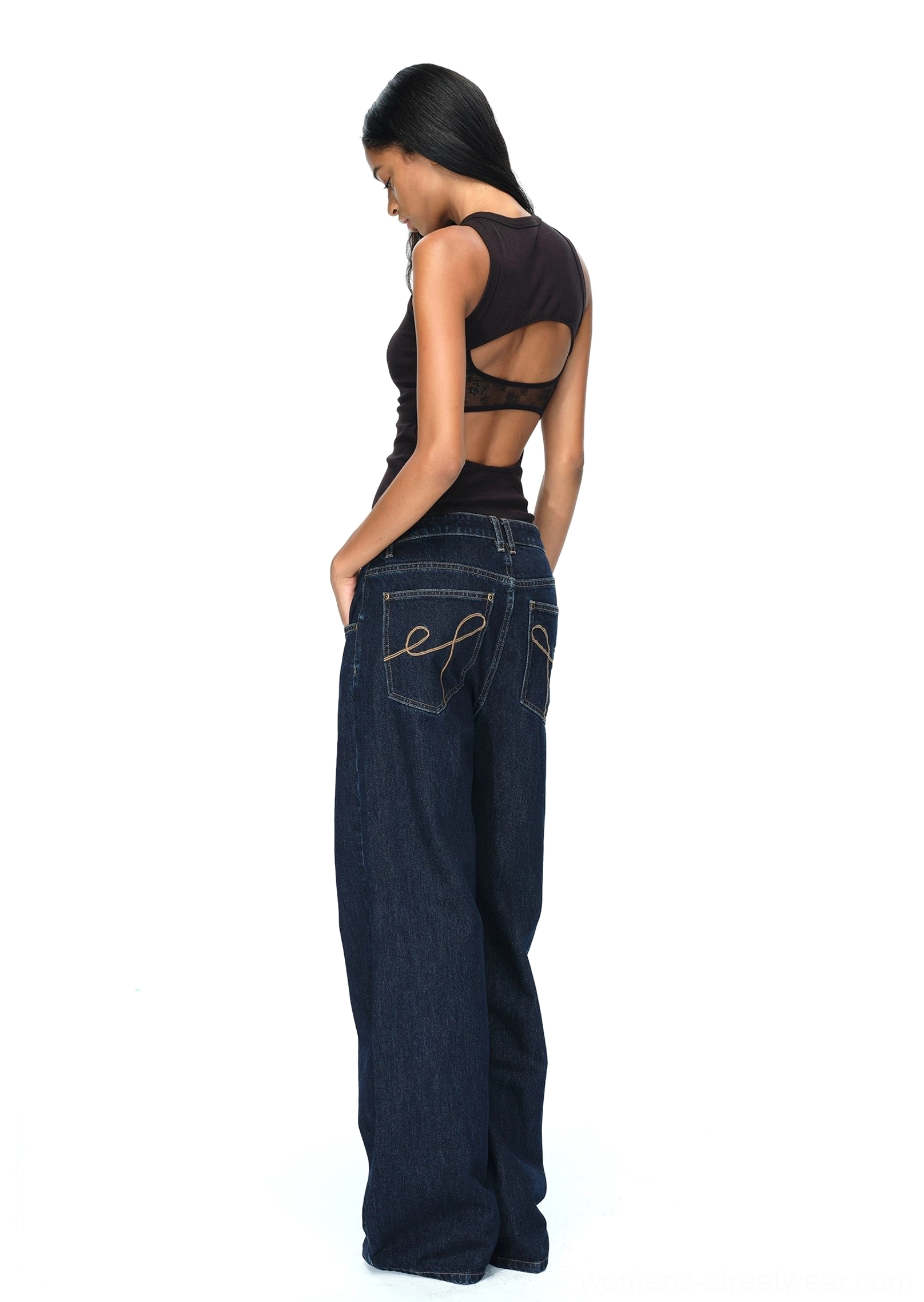 Dark blue raw denim wide-leg jeans product image highlighting the relaxed streetwear silhouette and deep indigo color
