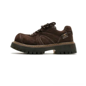 Dark brown chunky suede work sneakers shown in left side profile with contrast stitching, lace-up closure, branded-style heel tab, and thick rugged platform lug sole