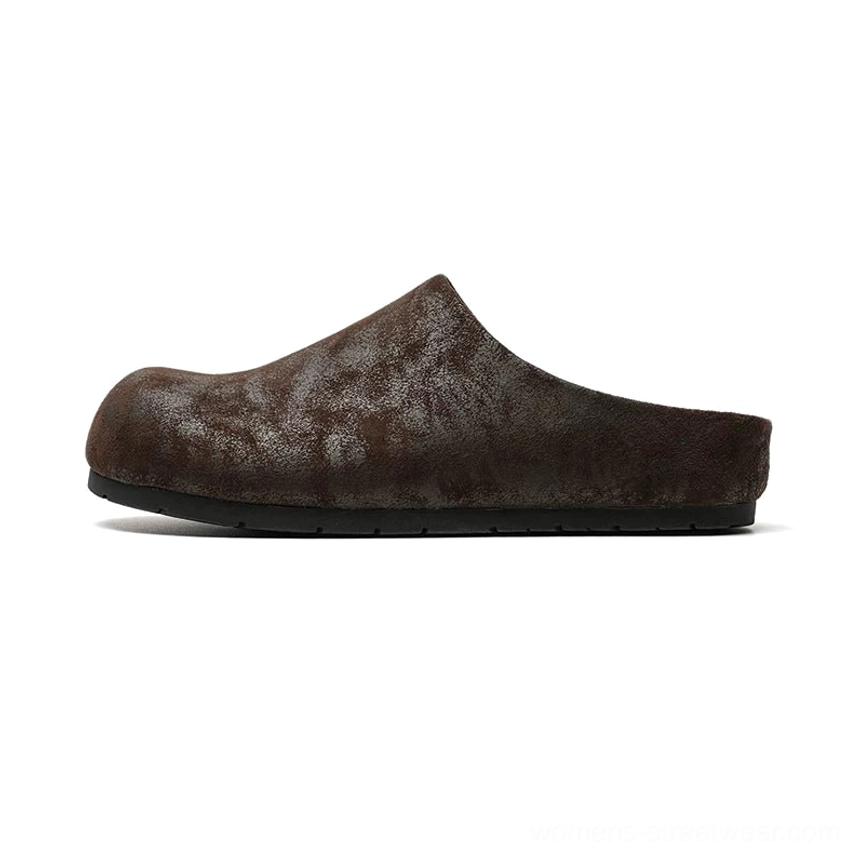 Dark brown cracked leather closed-toe mule clog shown in side profile with vintage textured upper, rounded toe, and low black sole