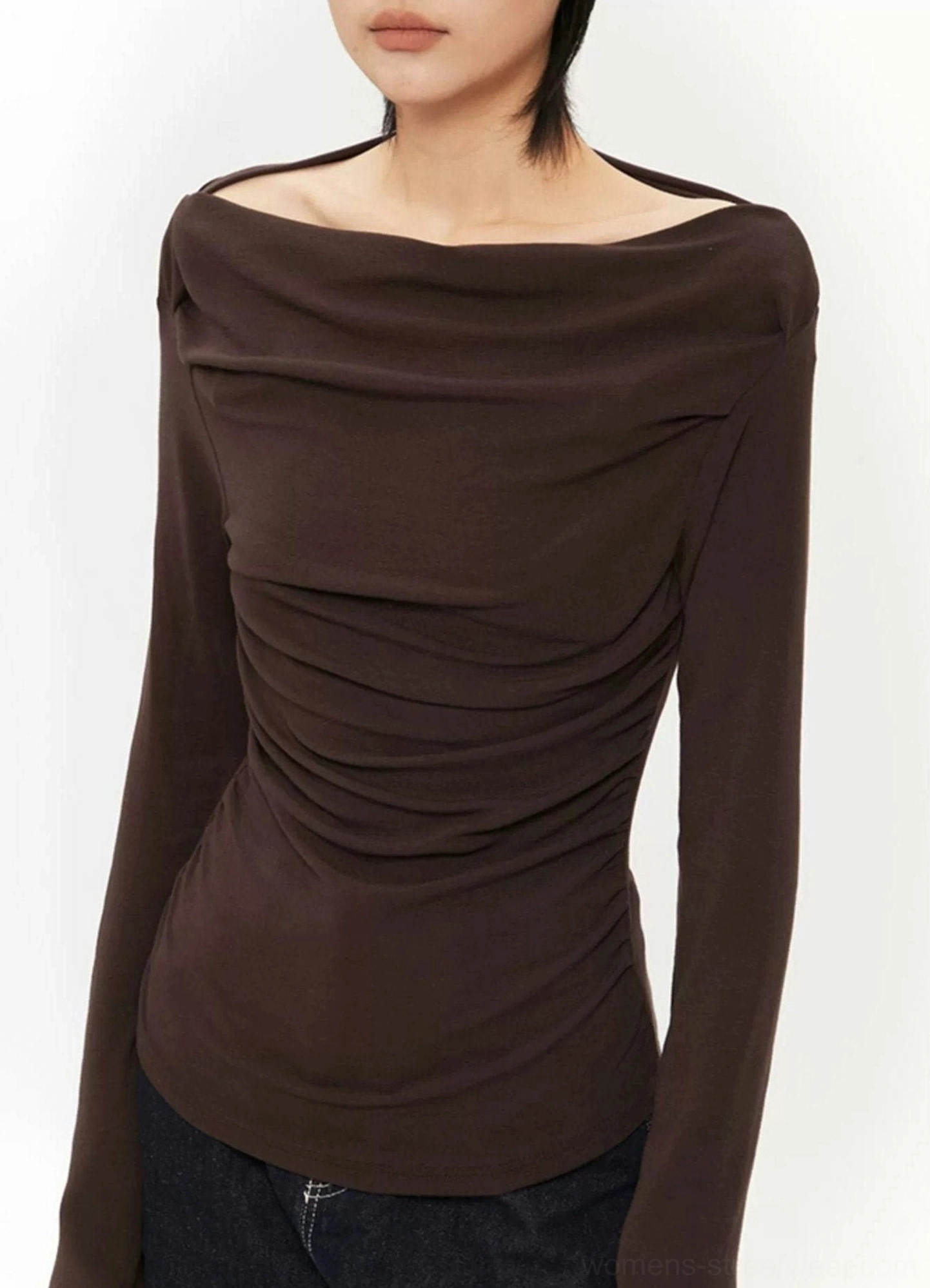 Side silhouette of a dark brown fitted off-shoulder ruched top with smooth gathered fabric and slim long sleeve