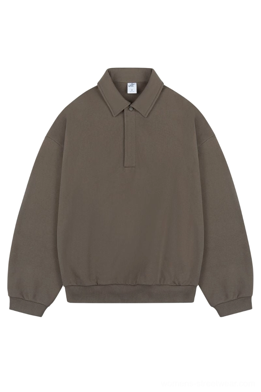 Dark brown oversized long sleeve polo sweater with quarter button placket, ribbed collar, drop shoulders, and relaxed Korean streetwear fit