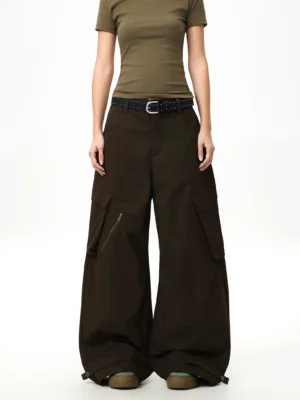 Straight front view of dark brown wide-leg cargo pants with classic waistband belt loops oversized side pockets and utility streetwear styling