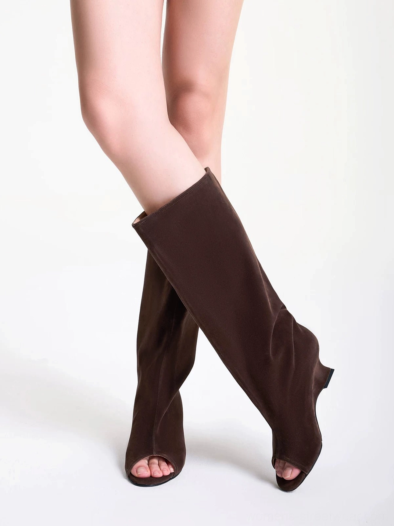 Dark brown matte peep toe wedge boots worn with a relaxed straight knee-high shaft