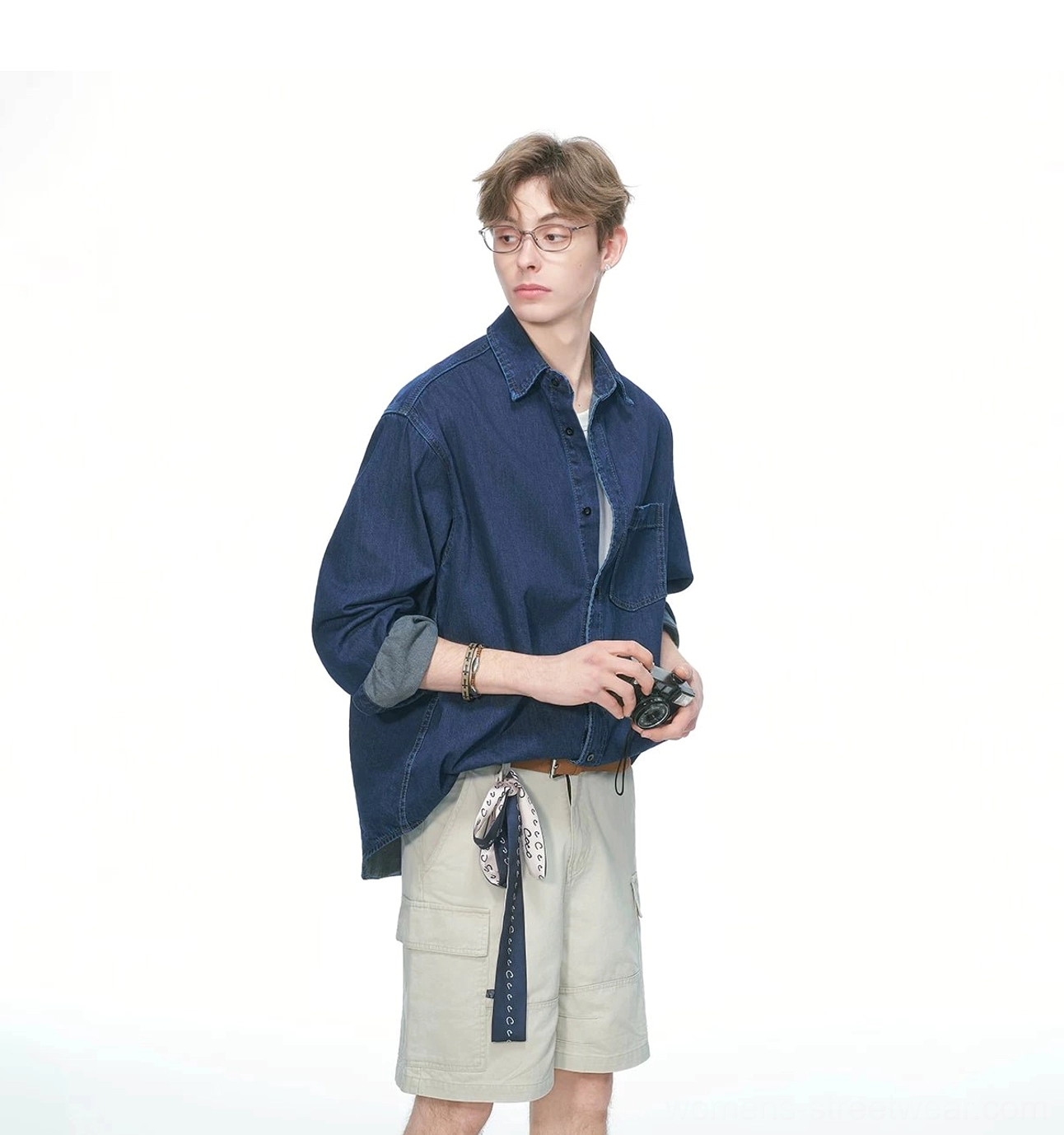 Front view of a dark denim oversized shirt with open top buttons, rolled cuffs, and bandana styling for a Korean streetwear outfit