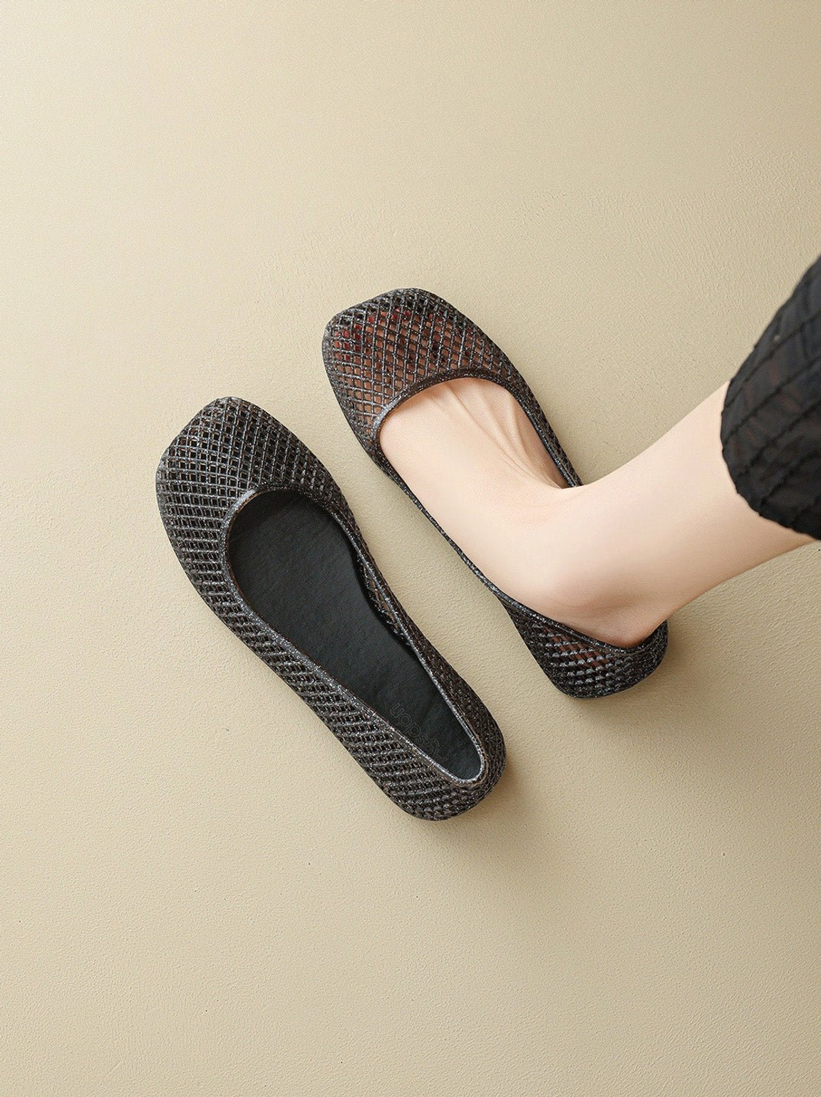 Top view of dark two-tone glitter mesh jelly ballet flat with classic rounded toe
