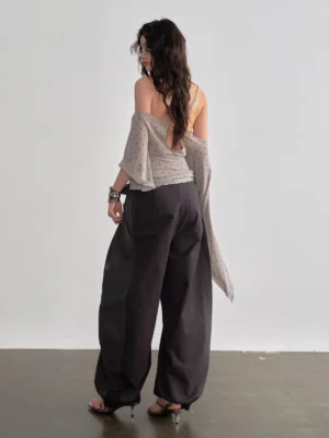 Dark gray high waist balloon streetwear pants back view showing relaxed wide leg drape and tie waist