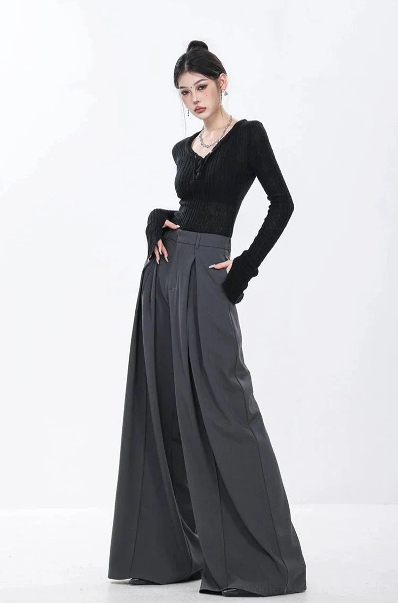 Dark gray businesscore wide-leg pants with tailored pleats and polished minimalist urban styling