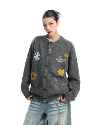 Dark gray floral embroidered knit cardigan with soft textured fabric and relaxed oversized fit