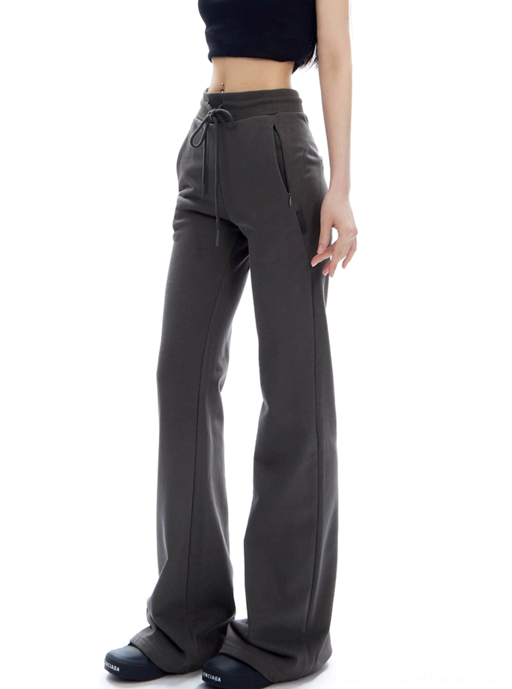 Dark Gray high-waist drawstring flared sweatpants shown from the side with zippered pockets and floor-length streetwear fit