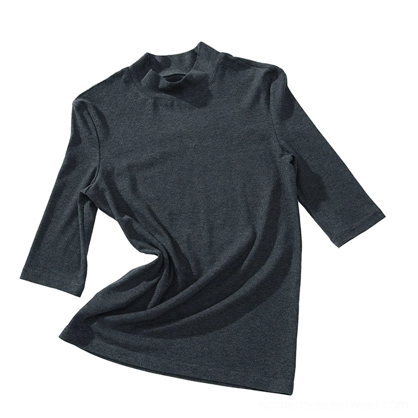 Dark gray mock neck half-sleeve top with soft stretch fabric and minimalist Seoul-inspired styling