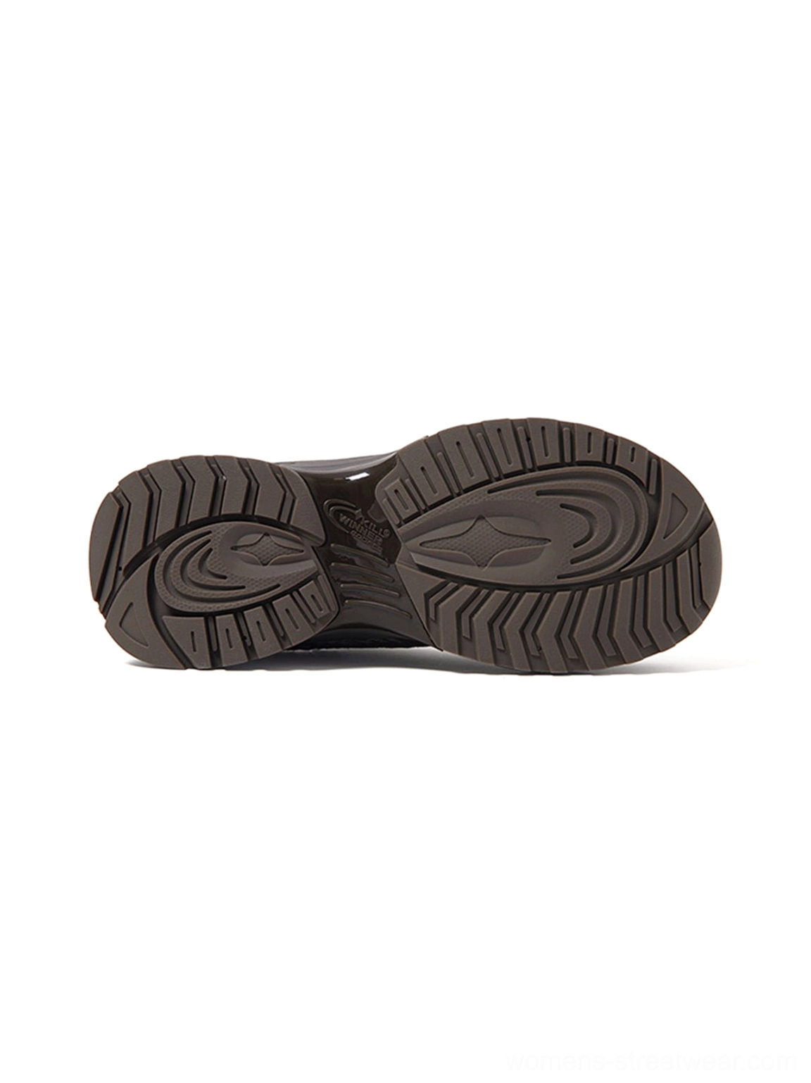 Dark gray runner sneaker rubber outsole close-up with durable multi-pattern traction tread