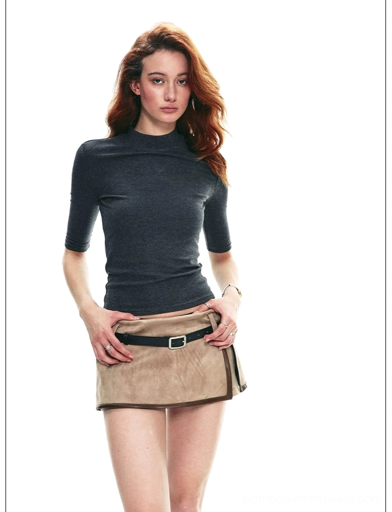 Front close-up of dark gray TENCEL mock neck half-sleeve streetwear top with tan skirt styling
