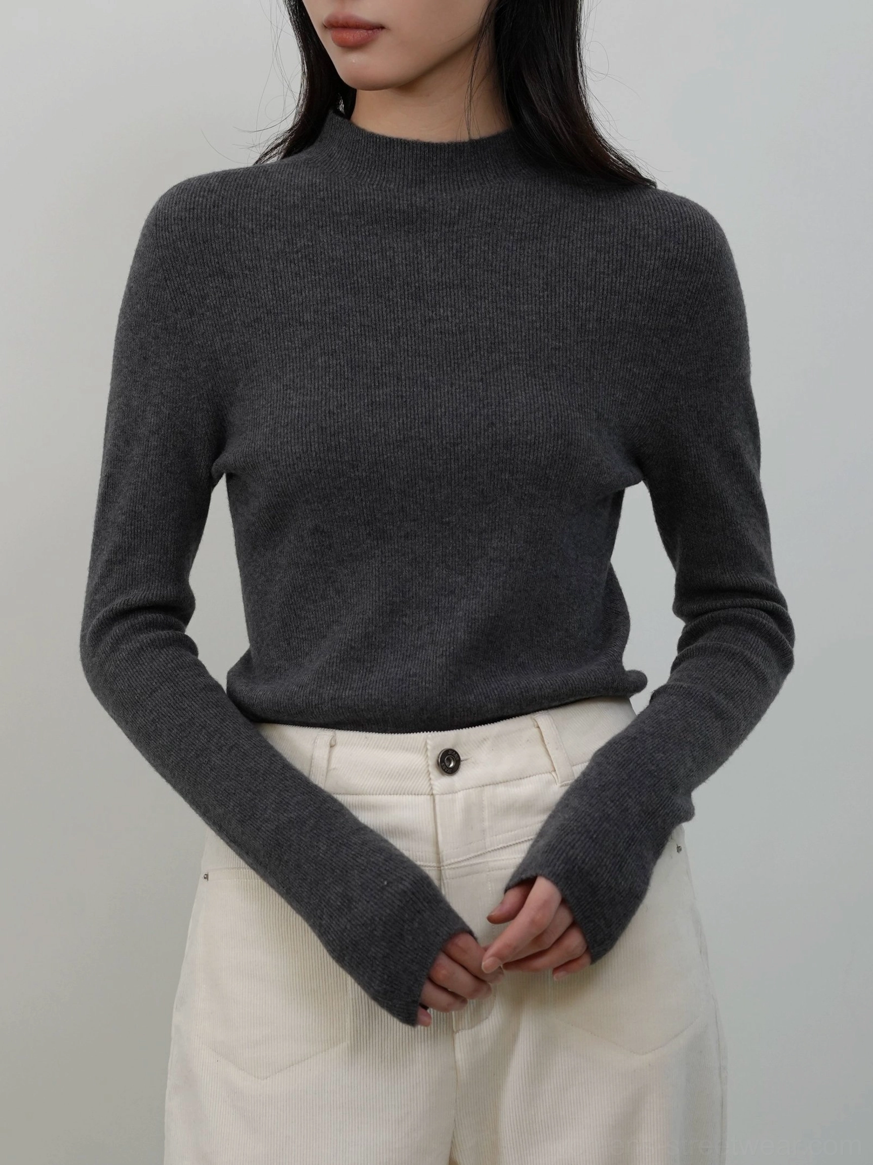 Dark gray women's mock neck ribbed sweater designed as a slim base layer for Korean fashion outfits