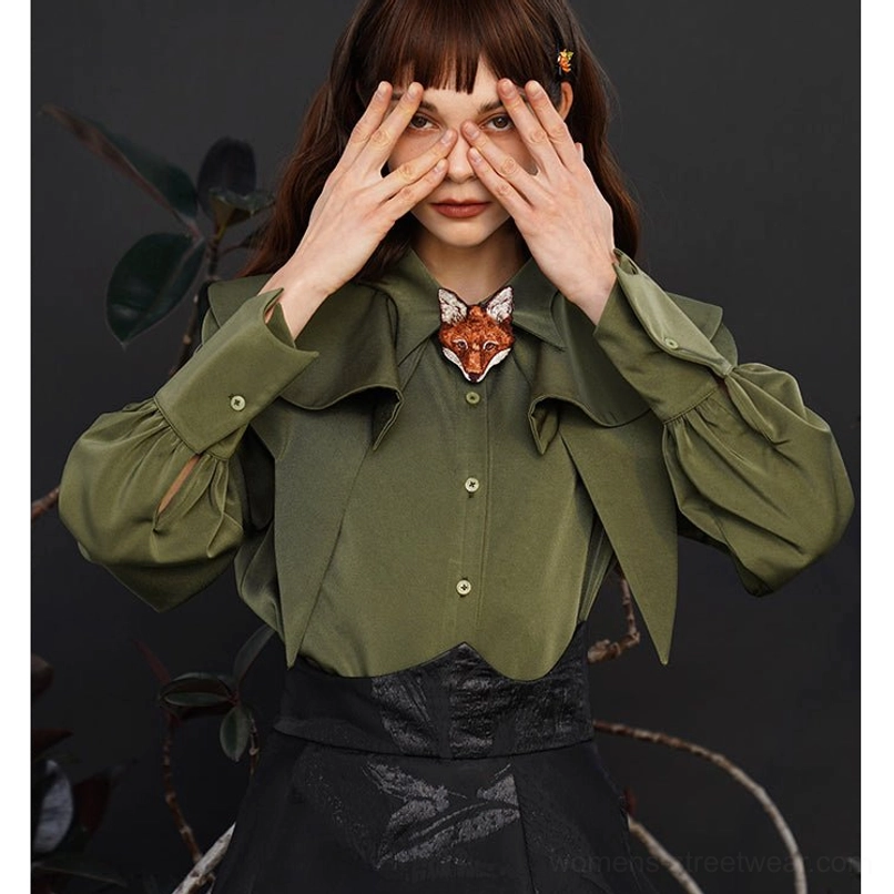 Dark green Korean style blouse featuring a fox charm, layered ruffle collar, long gathered sleeves, and button closure