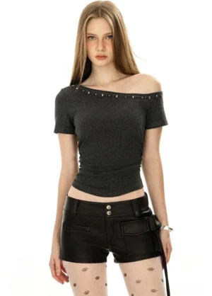 Dark grey asymmetric off-shoulder crop top with metal studded neckline streetwear outfit