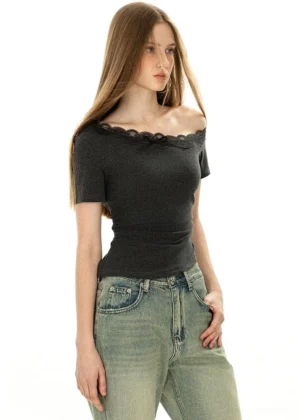 Dark grey Korean streetwear off-shoulder lace neckline top shown in a side three-quarter view