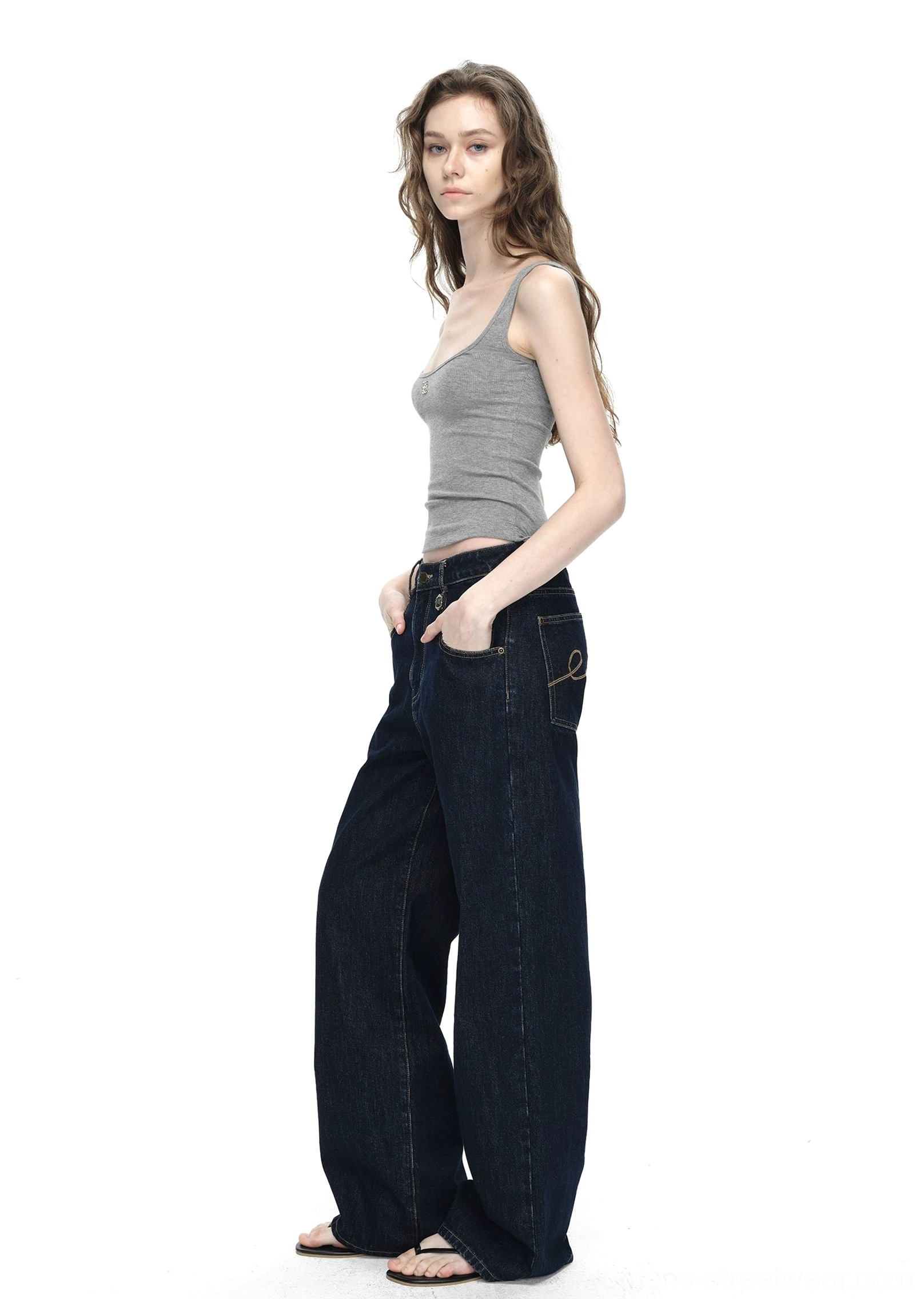 Contemporary dark indigo wide-leg jeans with durable 100 percent cotton fabric and relaxed casual fit