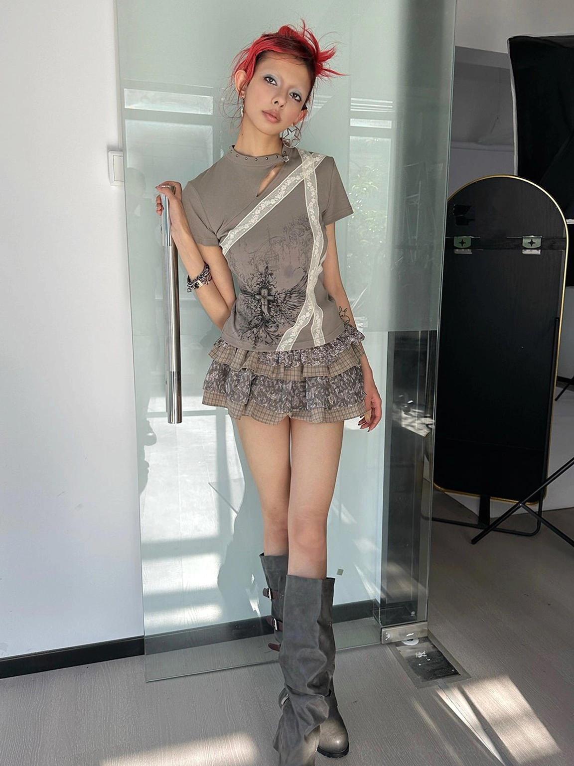 Full length streetwear outfit featuring dark khaki cross wing cheongsam collar slim tee with plaid skirt