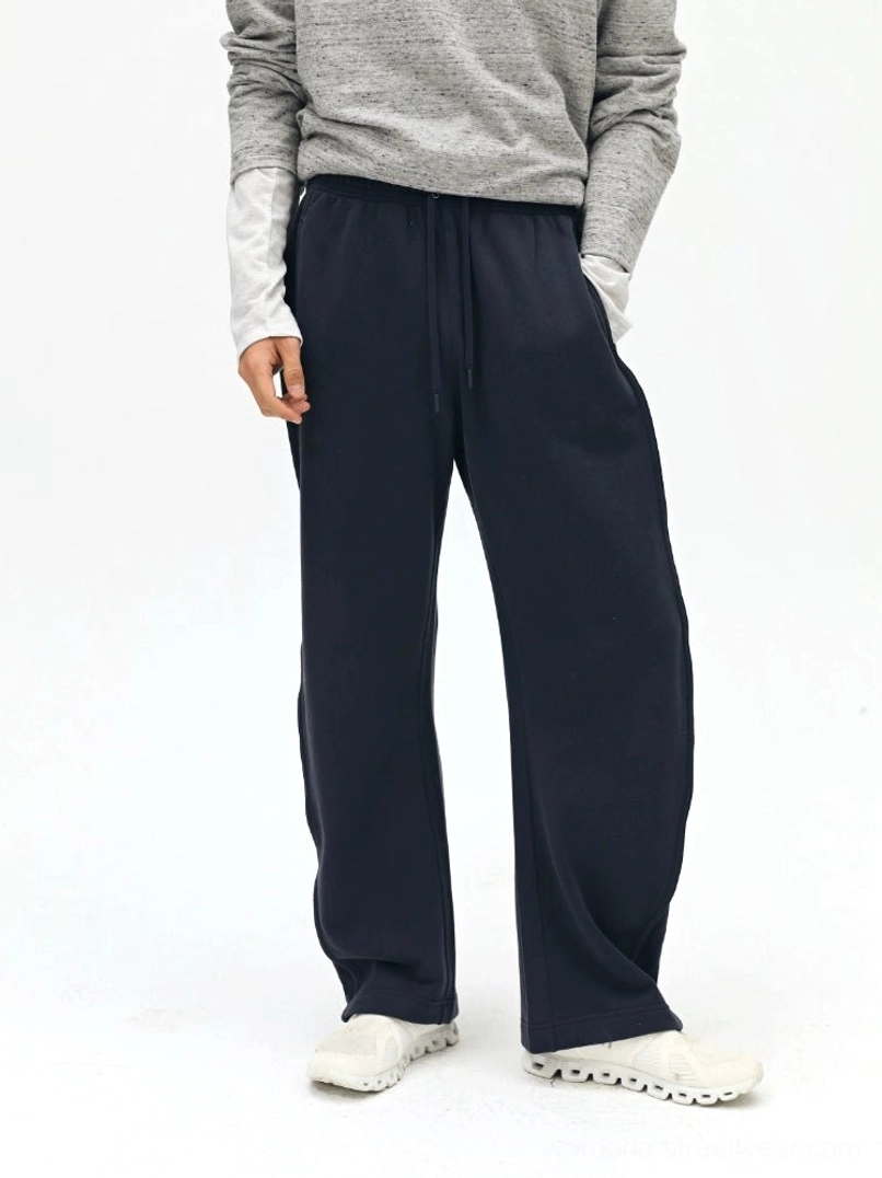 Dark navy twill sweatpants front view - straight leg cut with elastic drawstring waistband and soft texture