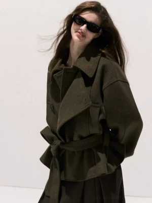 Dark olive oversized wrap collar wool blend coat shown in a three-quarter front studio view with wide notched lapel and relaxed dropped shoulders