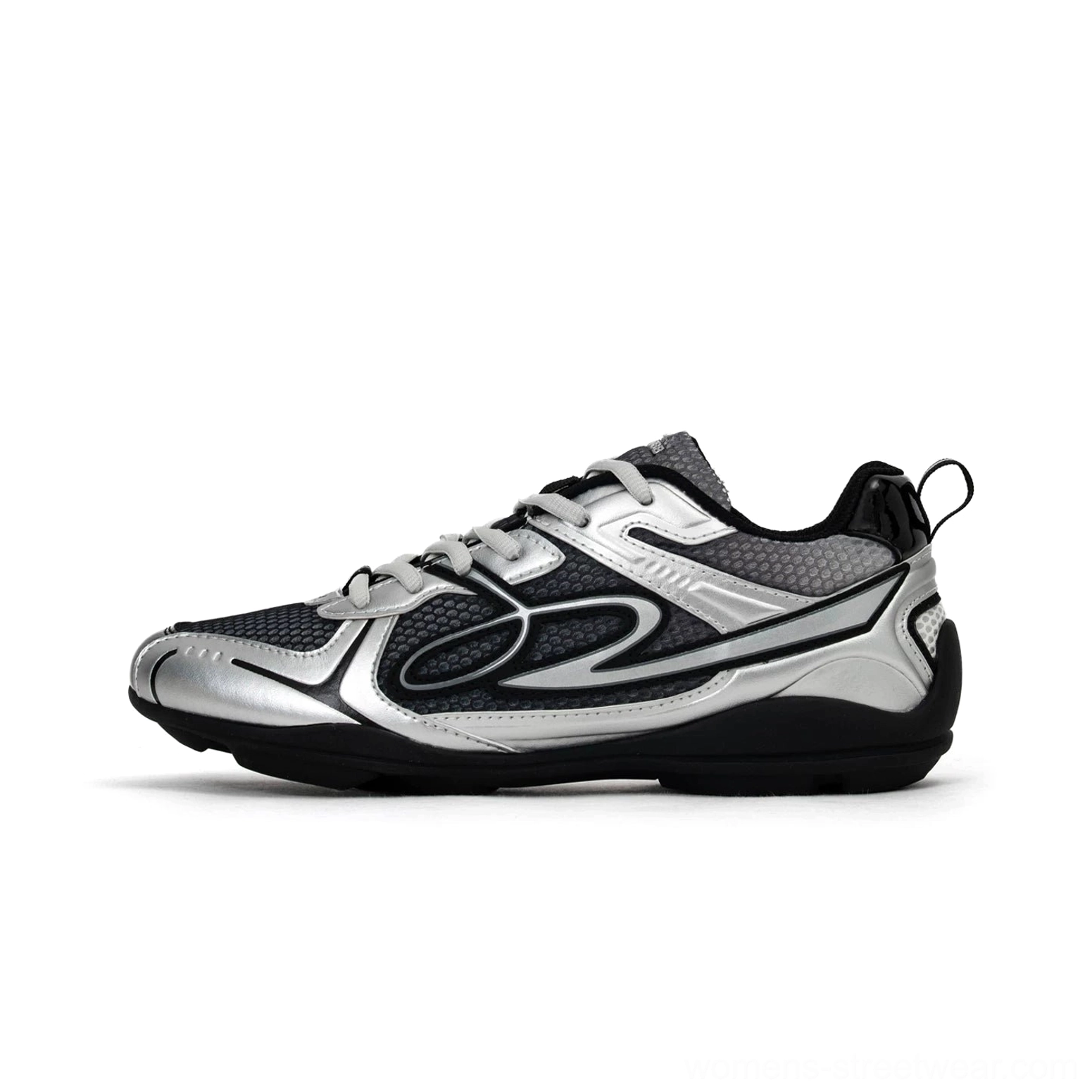 Dark silver futuristic retro runner sneaker on a white background with black mesh panels metallic silver overlays heel pull tab and wave-inspired sole
